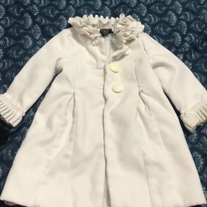 A small vintage coat.